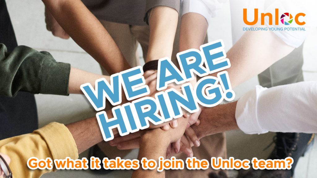 A group of diverse hands stacked together with bold text reading We Are Hiring! and a logo for Unloc in the corner. Text below asks if you have what it takes to join the Unloc team.