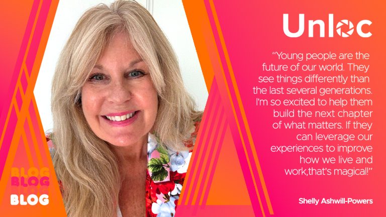 A woman smiling at the camera.