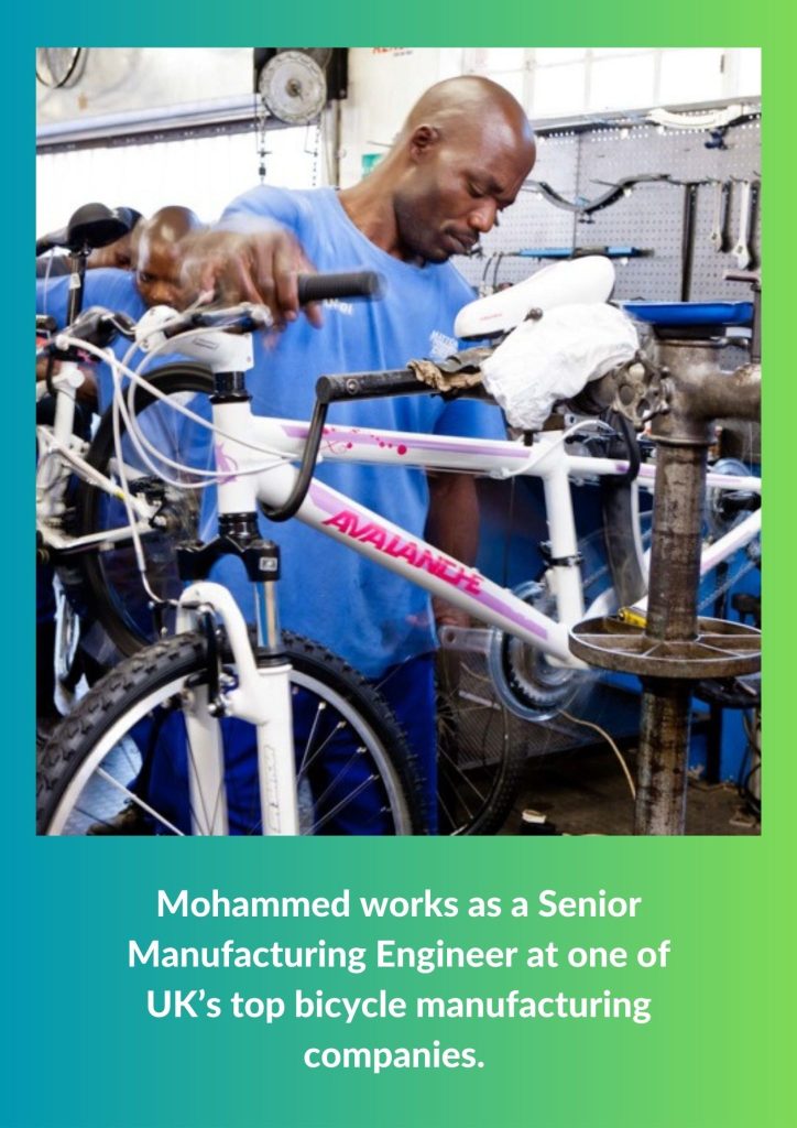 A man in a blue shirt inspects and repairs a white bicycle in a busy workshop filled with tools and other bikes.
