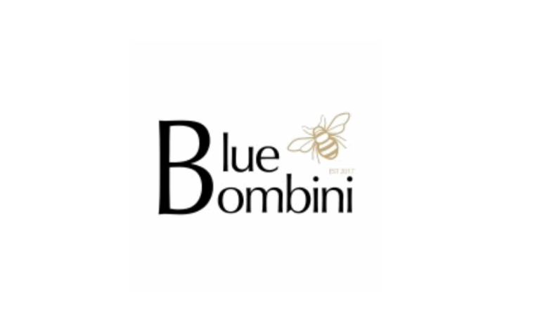The Blue Bombini logo with a large B, a gold bee illustration, and the text Blue Bombini EST 2017 on a white background.