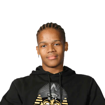 A young person with plaited hair wearing a black hoodie featuring a gold and white graphic design on the front, against a plain light background.