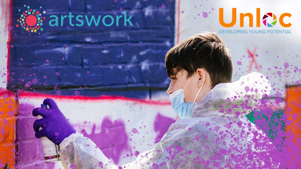 A young person in gloves and a mask spray paints a mural. Artswork and Unloc logos are visible in the image corners.