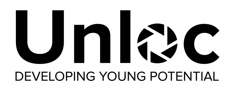 The word Unloc with the letter o shaped like a camera shutter; below it, the text reads DEVELOPING YOUNG POTENTIAL.