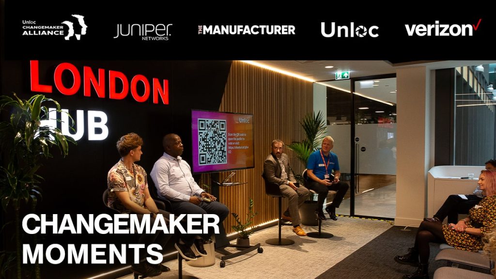 Four people sit on stage in a modern office space during a panel event at the London Hub, with audience members seated and sponsor logos displayed above.