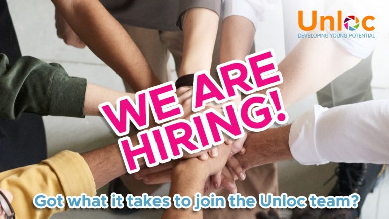 Several people stack their hands together in the centre, with bold text stating WE ARE HIRING! and the Unloc logo in the top right corner.